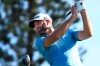 Dustin Johnson watches a shot during the second round of the Tournament of Champions golf event Friday, Jan. 8, 2021, at Kapalua Plantation Course in Kapalua, Hawaii. (Matthew Thayer/The Maui News via AP)