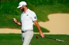 Dustin Johnson looks at his ball after missing his birdie putt on the 17th green during first round of the Tournament of Champions golf event, Thursday, Jan. 2, 2020, at Kapalua Plantation Course in Kapalua, Hawaii. (AP Photo/Matt York)