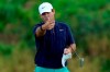 Patrick Reed looks at the lie on the 18th green after missing his birdie putt during second round of the Tournament of Champions golf event, Friday, Jan. 3, 2020, at Kapalua Plantation Course in Kapalua, Hawaii. (AP Photo/Matt York)