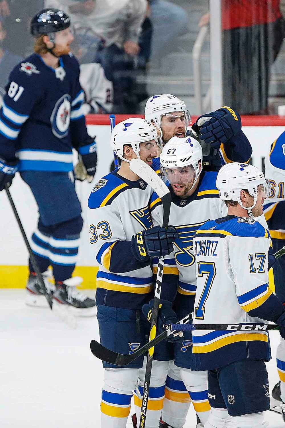 St. Louis Blues' David Perron (57) celebrates the game winning goal in overtime. (John Woods / The Canadian Press)