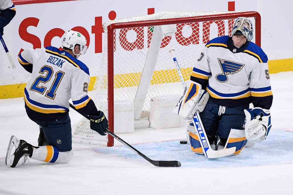 CP
St. Louis Blues goaltender Jordan Binnington (50) and Tyler Bozak (21) react after allowing a goal during third period NHL. (Fred Greenslade / The Canadian Press)