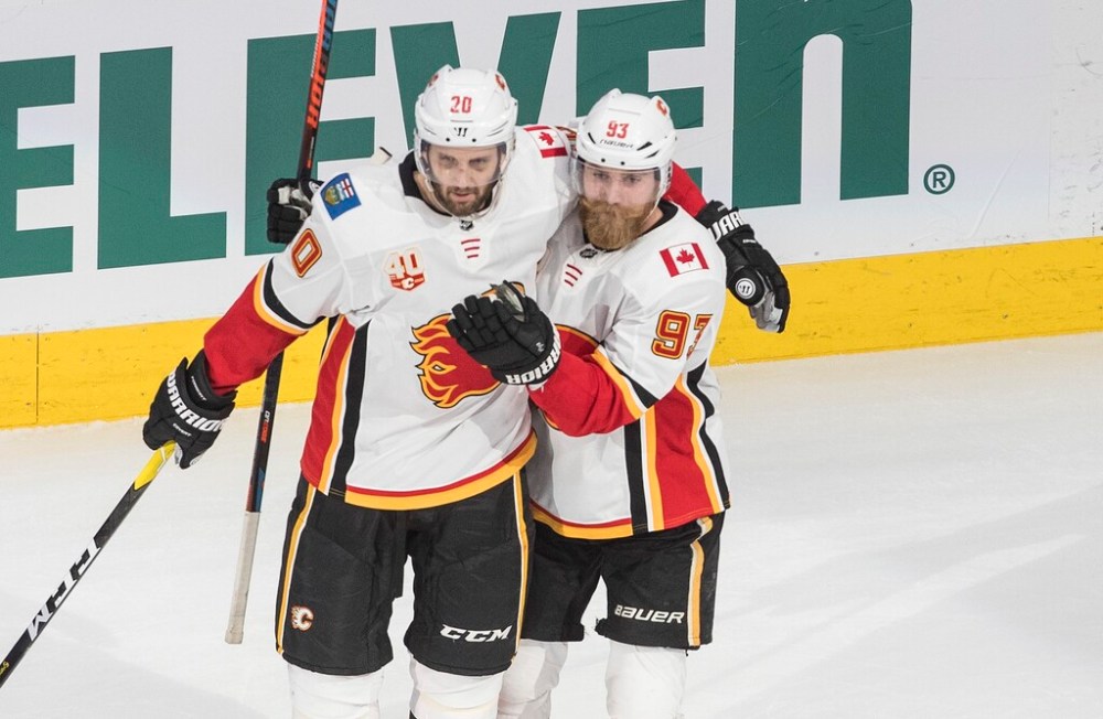 Derek Forbort (left) and Sam Bennett celebrate a goal during the Flames' series against the Dallas Stars in this year's playoffs. (Jason Franson / The Canadian Press files)