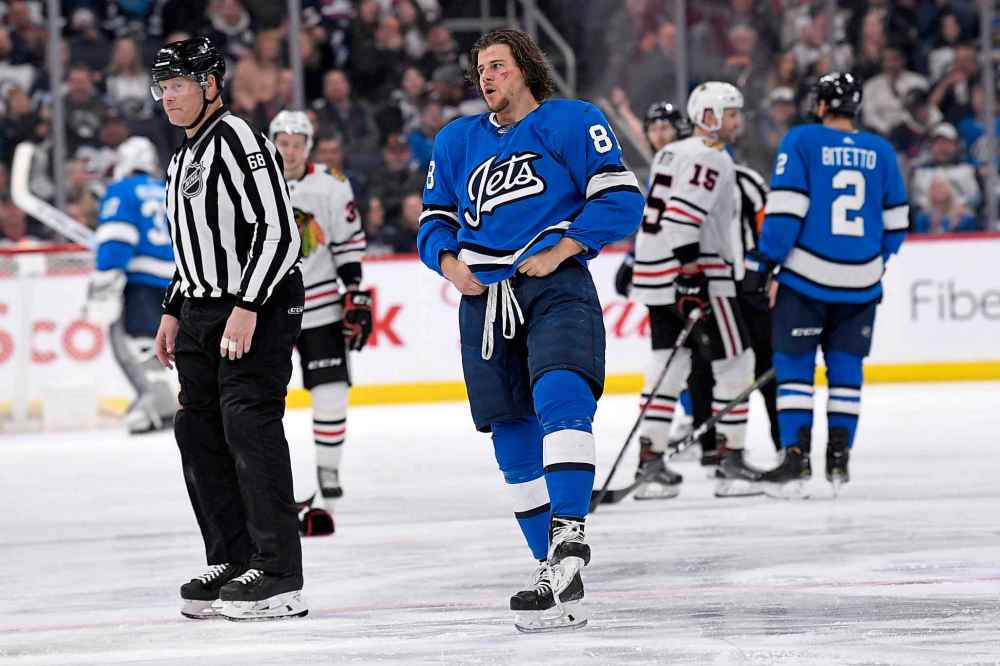 Winnipeg Jets' Nathan Beaulieu (88) skates to the penalty box after fighting with Chicago Blackhawks' Nick Seeler during the second period.(Fred Greenslade / The Canadian Press)