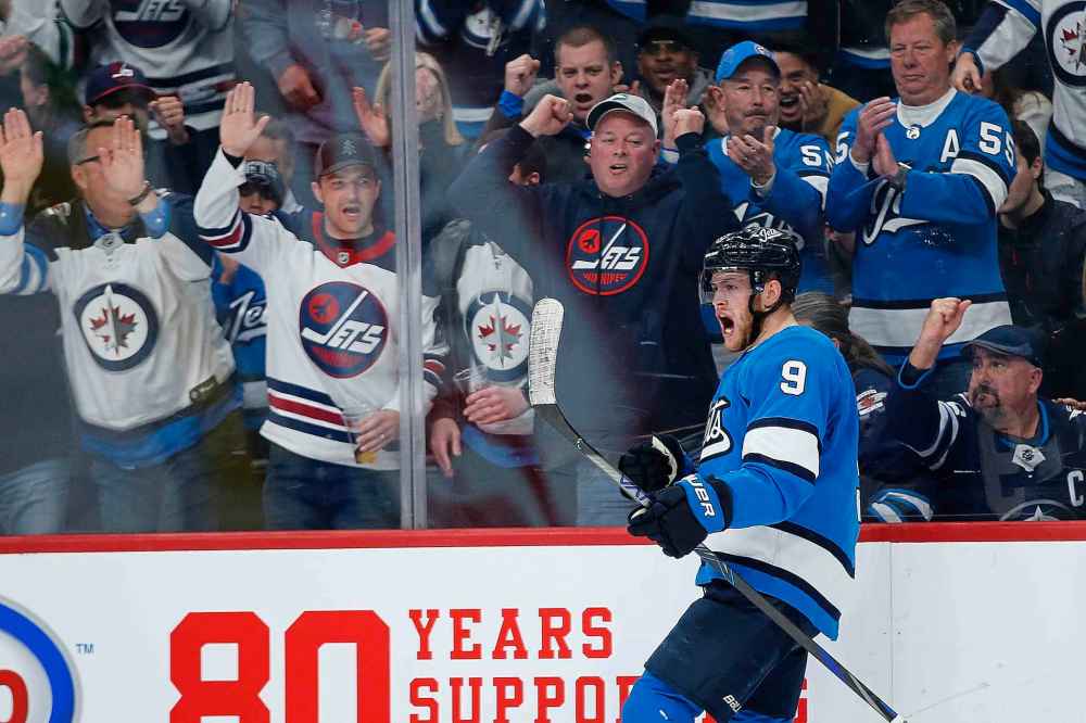 Winnipeg Jets' Andrew Copp (9) celebrates his goal against the St. Louis Blues during the second period. (John Woods / The Canadian Press)