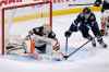 FRED GREENSLADE / THE CANADIAN PRESS
Anaheim Ducks goaltender John Gibson (36) covers up the puck as Winnipeg Jets' Nikolaj Ehlers (27) looks for the rebound during third period NHL action in Winnipeg on Sunday, Dec. 8, 2019./p