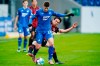 Hoffenheim's Andrej Kramaric, front, and Frankfurt's Makoto Hasebe battle for the ball during the Bundesliga soccer match between TSG 1899 Hoffenheim and Eintracht Frankfurt in Sinsheim, Germany, Sunday, Feb. 7, 2021. (Uwe Anspach/dpa via AP)