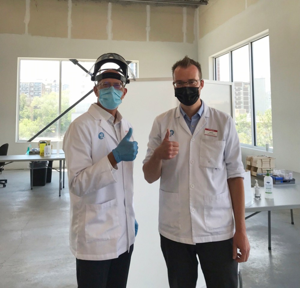 SUPPLIED
Pharmacist and retired Shoppers Drug Mart owner Hans Epp (L) and Adrian Gulowaty, pharmacist-owner of the Osborne Village Shoppers location, at the store’s vaccine clinic.