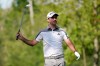 Nick Taylor, of Canada, hits from the 12th tee during the first round of the BMW Championship golf tournament, Thursday, Aug. 27, 2020, at Olympia Fields Country Club in Olympia Fields, Ill. (AP Photo/Charles Rex Arbogast)