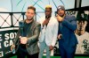 Chicago White Sox's Yoan Moncada, left, Luis Robert, center, and Jose Abreu pose for a video during the team's annual fan convention Friday, Jan. 24, 2020, in Chicago. (AP Photo/Charles Rex Arbogast)