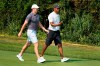 Rory McIlroy, left, and Tiger Woods head down the first hole during a practice round Wednesday, Aug. 26, 2020, for the BMW Championship golf tournament at the Olympia Fields Country Club in Olympia Fields, Ill. (AP Photo/Charles Rex Arbogast)
