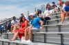 Fans on a rooftop overlooking Wrigley Field take In a baseball game between the Chicago Cubs and the Milwaukee Brewers, Saturday, July 25, 2020, in Chicago. (AP Photo/Teresa Crawford)