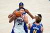 Philadelphia 76ers' Ben Simmons (25) goes up for a dunk during the second half of an NBA basketball game against the Indiana Pacers, Sunday, Jan. 31, 2021, in Indianapolis. (AP Photo/Darron Cummings)