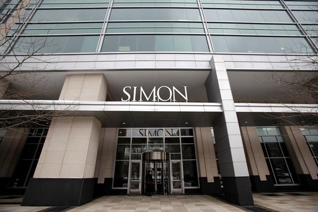 FILE - This Feb. 16, 2010 file photo shows the headquarters of the Simon Property Group in downtown Indianapolis. Simon Properties said Wednesday, June 10, 2020, that it is pulling out of its $3.6 billion to buy rival Taubman, citing the coronavirus pandemic which has forced many malls to temporarily close their doors. It is the second major retail deal to fall apart due to the pandemic. (Danese Kenon/The Indianapolis Star via AP, File)