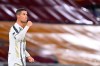 Juventus' Cristiano Ronaldo, right, gestures during the Italian Serie A soccer match between Roma and Juventus at Rome's Olympic stadium, Sunday, Sept. 27, 2020. (Alfredo Falcone/LaPresse via AP)