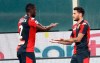 Genoa's Antonio Sanabria, right, celebrates after a goal with Cristian Zapata during a serie A soccer match between Genoa and Verona, at the Luigi Ferraris stadium in Genoa, Italy, Sunday, Aug. 2, 2020. (Tano Pecoraro/Lapresse via AP)