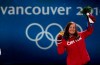 Canada's Maelle Ricker celebrates her gold medal win for snowboard cross during a medal ceremony at the 2010 Winter Olympic Games in Vancouver on February 17, 2010. THE CANADIAN PRESS/Jonathan Hayward