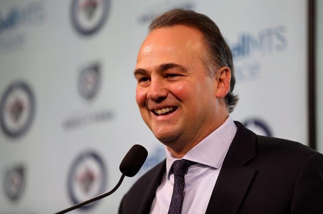 Former Winnipeg Jets great Dale Hawerchuk speaks prior to having his banner raised to the rafters of Bell MTS Place before the Jets game against the Arizona Coyotes in Winnipeg on November 14, 2017. Longtime Winnipeg Jets star Dale Hawerchuk has died after a battle with cancer. He was 57. THE CANADIAN PRESS/Trevor Hagan