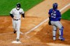 New York Yankees' Clint Frazier scores a run behind Toronto Blue Jays catcher Alejandro Kirk (85) after Tyler Wade was hit by a pitch with the bases loaded during the third inning of a baseball game in New York on September 15, 2020. The sight of position players having pitches thrown at batting practice speed clobbered over the wall took the shine off the opener of a critical series between the Blue Jays and Yankees and renewed discussion about whether a mercy rule should be considered at the big-league level. THE CANADIAN PRESS/AP - Adam Hunger