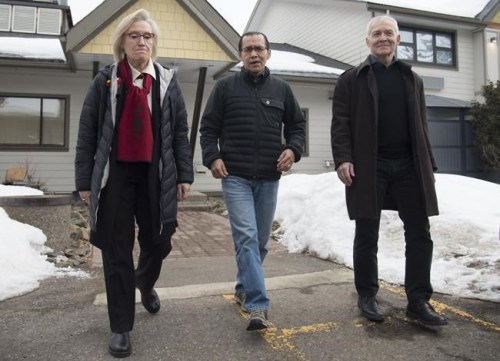 Wet'suwet'en hereditary leader Chief Woos, also known as Frank Alec, centre, Minister of Crown-Indigenous Relation, Carolyn Bennett, left, and B.C. Indigenous Relations Minister Scott Fraser arrive to address the media in Smithers, B.C., on March 1, 2020. Wet'suwet'en hereditary chiefs and representatives of the federal and provincial governments are expected to sign an agreement today that politicians say will rebuild relationships after anti-pipeline protests and blockades earlier this year. But the deal has also fractured an Indigenous community in B.C.'s Interior. THE CANADIAN PRESS/Jonathan Hayward