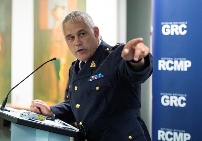 RCMP Deputy Commissioner Mike Duheme points towards a map with timestamps indicating the path of an armed man who breached the gates of Rideau Hall on Thursday, during a news conference at the RCMP National Division in Ottawa, on Friday, July 3, 2020. Police say the man charged with ramming a truck through a date at Rideau Hall last week was armed with two shotguns, a rifle and a revolver, and threatened Prime Minister Justin Trudeau.THE CANADIAN PRESS/Justin Tang