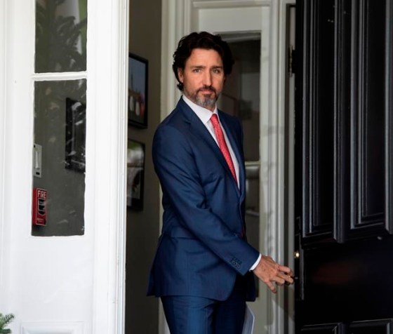 Prime Minister Justin Trudeau arrives for his daily news conference on the COVID-19 pandemic outside his residence at Rideau Cottage in Ottawa, on Tuesday, May 19, 2020. THE CANADIAN PRESS/Justin Tang