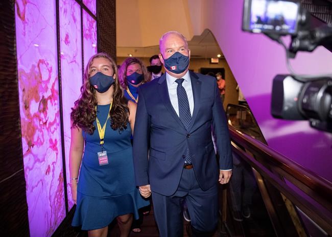 Erin O'Toole walks with his daughter Mollie, after being announced as the new leader of the Conservative Party of Canada, in Ottawa, on Monday, Aug. 24, 2020. THE CANADIAN PRESS/Justin Tang