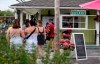 People stand physically distanced in a line outside La Cigale, an ice cream shop in Chelsea, Que., as temperatures reached 28 degrees C, feeling like 31 degrees C with the humidex, on Sunday, May 24, 2020, in the midst of the COVID-19 pandemic. THE CANADIAN PRESS/Justin Tang