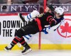 Winnipeg Jets defenceman Sami Niku (8) and Ottawa Senators left wing Brady Tkachuk (7) fall to the ice during third period NHL action in Ottawa on Tuesday, Jan. 19, 2021. THE CANADIAN PRESS/Sean Kilpatrick