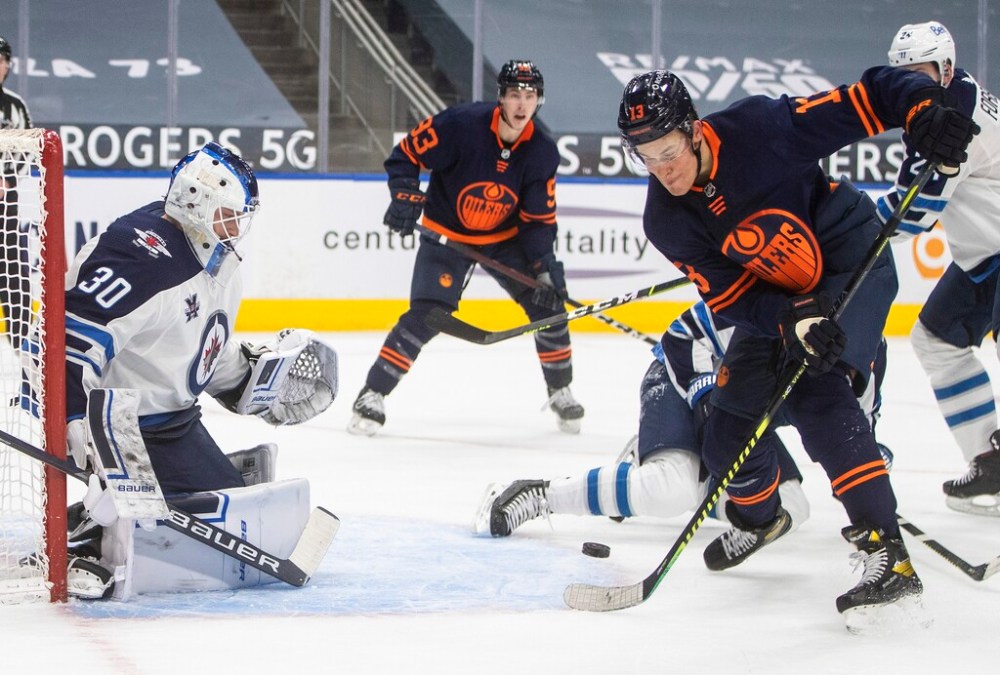 CP
Winnipeg Jets goalie Laurent Brossoit stops a shot by Edmonton Oilers' Jesse Puljujarvi during the second period.THE CANADIAN PRESS/Jason Franson