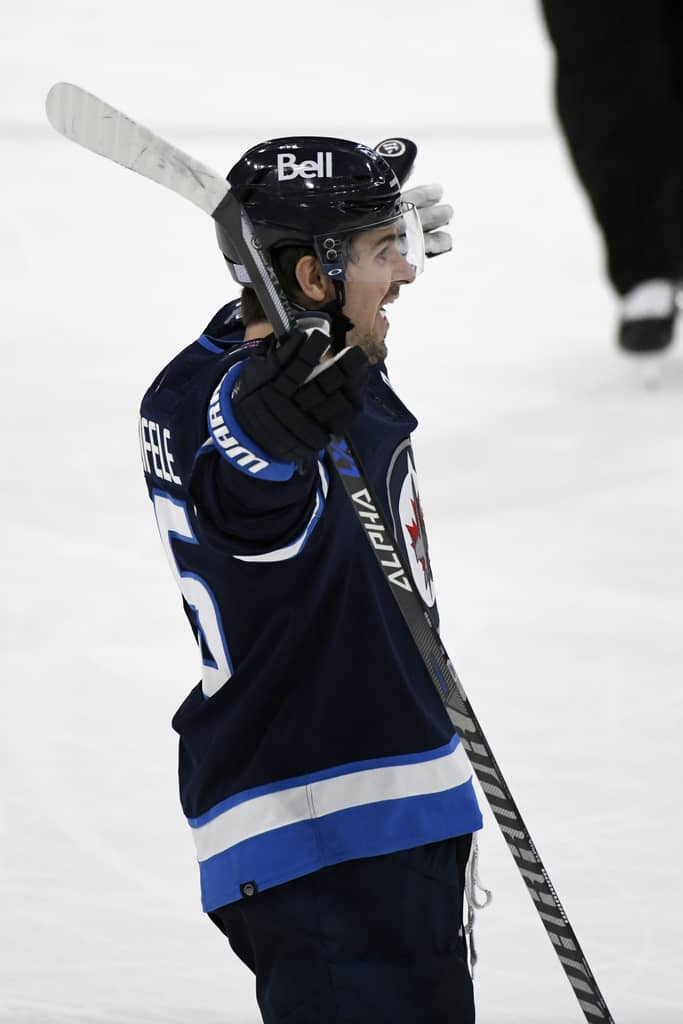 CP
Winnipeg Jets' Mark Scheifele celebrates scoring the shootout winning goal against the Dallas Stars on Tuesday. THE CANADIAN PRESS/Fred Greenslade