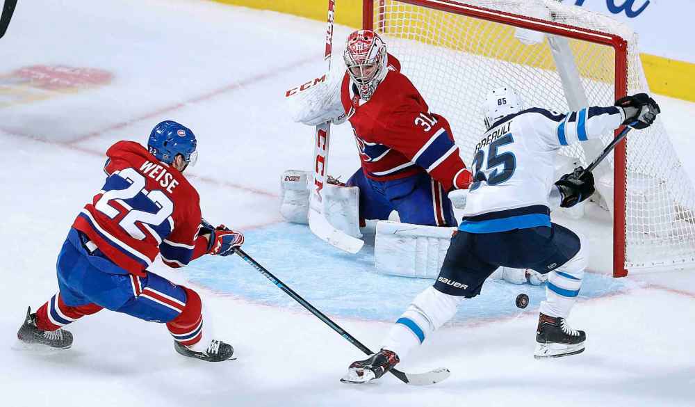 (TREVOR HAGAN / WINNIPEG FREE PRESS)
Winnipeg Jets' Mathieu Perreault can't score from in close on Montreal Canadiens' goaltender Carey Price during the first period in Montreal, Monday.