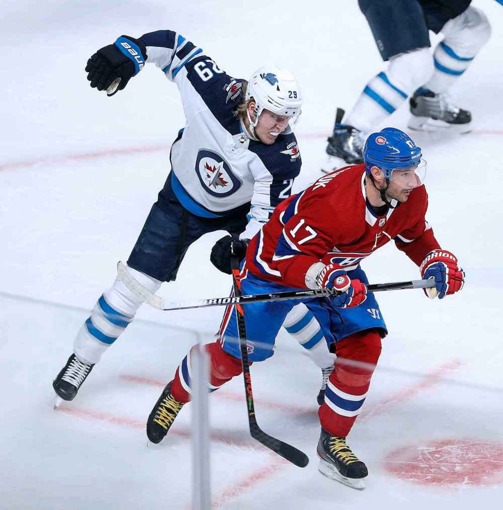 (TREVOR HAGAN / WINNIPEG FREE PRESS)
Winnipeg Jets' Patrik Laine shadows Ilya Kovalchuk in his his first game with the Montreal Canadiens Monday.