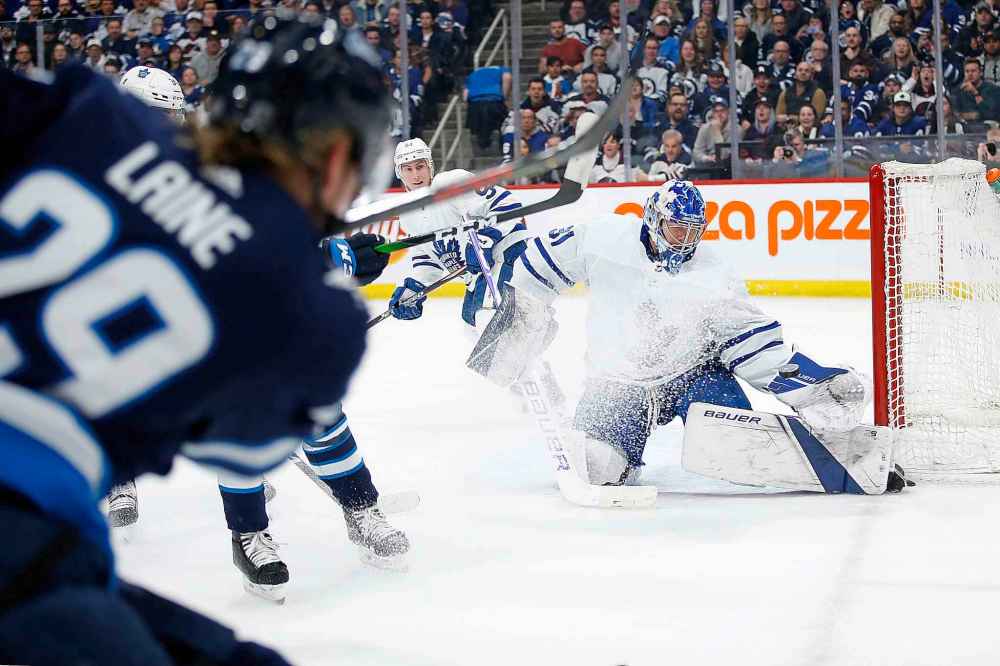 THE CANADIAN PRESS/John Woods
Winnipeg Jets' Patrik Laine scores on Toronto Maple Leafs goaltender Frederik Andersen in the second period.