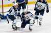 (AP Photo/Scott Kane)
Winnipeg Jets' Andrew Copp, centre, celebrates after scoring during the third period against the St. Louis Blues, Thursday in St. Louis.
