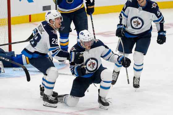 (AP Photo/Scott Kane)Winnipeg Jets' Andrew Copp, centre, celebrates after scoring during the third period against the St. Louis Blues, Thursday in St. Louis.