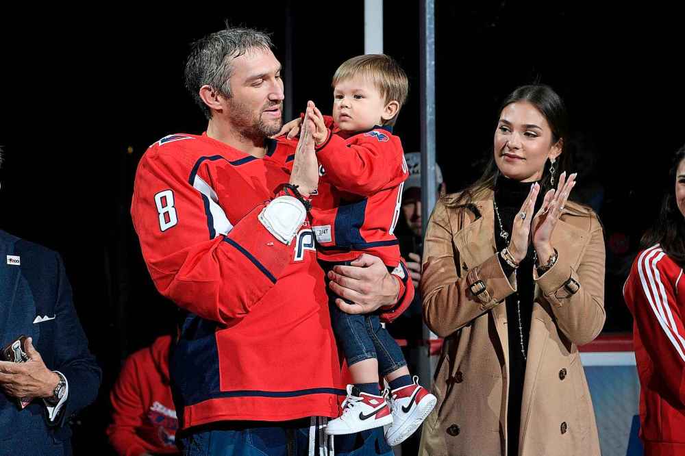 (AP Photo/Nick Wass)
Washington Capitals left wing Alex Ovechkin son Sergei, centre, and wife, Nastya, right, applaud during a ceremony to honor Ovechkin for his 700th goal, before the game against the Winnipeg Jets, Tuesday in Washington.