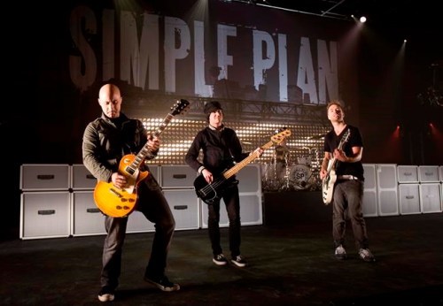 Members of Simple Plan are seen in a Montreal studio Friday, Oct. 10, 2008. The bassist for Montreal rock band Simple Plan is leaving the group following anonymous sexual misconduct allegations against him on social media. David Desrosiers posted an apology on Instagram Thursday for the 