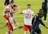 Toronto FC midfielder Alejandro Pozuelo, centre, celebrates with teammates Pablo Piatti, left, and Jonathan Osorio after scoring from the penalty spot during second half MLS soccer action against the Montreal Impact in Montreal, Friday, August 28, 2020. Toronto FC, which sits atop the Major League Soccer standings at 5-0-3, looks to extend its regular-season unbeaten streak to a league record-tying 19th straight game Tuesday when its hosts the Montreal Impact. THE CANADIAN PRESS/Graham Hughes