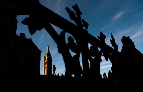 The Peace Tower on Parliament Hill in Ottawa is seen, in the midst of the COVID-19 pandemic, on Saturday, April 18, 2020. Justin Trudeau's ethical conduct will be put under an opposition microscope today during a rare summer sitting of the House of Commons, but the prime minister won't be there. THE CANADIAN PRESS/Justin Tang