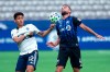 Vancouver Whitecaps forward Fredy Montero (12) battles for control of the ball with Montreal Impact defender Rudy Camacho (4) during first half MLS soccer action in Vancouver, B.C. Wednesday, September, 16, 2020. THE CANADIAN PRESS/Jonathan Hayward