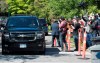 Members of the media photograph the vehicle carrying Meng Wanzhou, chief financial officer of Huawei, to B.C. Supreme Court in Vancouver, Wednesday, May 27, 2020. Canada joined with its major allies Thursday in condemning China for imposing a new national security law on Hong Kong, one day after a contentious B.C. court ruling in the Meng Wanzhou affair. THE CANADIAN PRESS/Jonathan Hayward