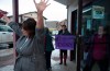 Wet'suwet'en member Bonnie George raises her arms as she leave talks with Minister of Crown-Indigenous Relation, Carolyn Bennett and the Wet'suwet'en hereditary chiefs in Smithers, B.C., on February 27, 2020. THE CANADIAN PRESS/Jonathan Hayward