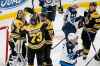 CP
Boston Bruins' Tuukka Rask (40) celebrates with Charlie McAvoy (73) and Patrice Bergeron (37) after defeating the Winnipeg Jets.  (Michael Dwyer / The Associated Press)