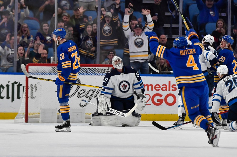 CP
Connor Hellebuyck has been decidedly average this season. (Adrian Kraus / The Associated Press files)