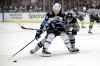 Mark Scheifele works the puck against Sean Walker Saturday in Los Angeles. (Marcio Jose Sanchez / The Associated Press)