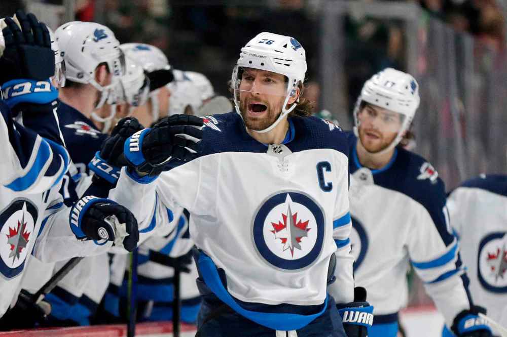 Winnipeg Jets right wing Blake Wheeler celebrates after scoring a goal on the Minnesota Wild in the first period. (Andy Clayton-King / The AssociatedPress)