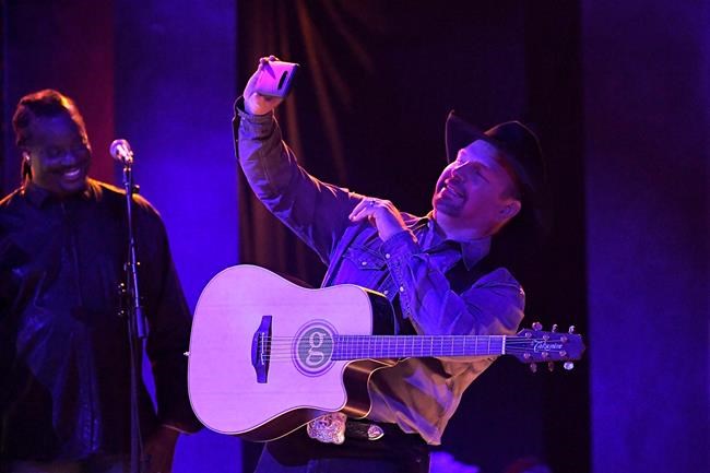 FILE - In this Wednesday, Nov. 13, 2019, file photo, Garth Brooks performs