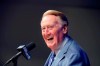 FILE - In this Sept. 24, 2016 file photo, Los Angeles Dodgers broadcaster Vin Scully answers questions during a news conference at Dodger Stadium in Los Angeles. Scully took a fall in his home Tuesday, April 21, 2020, and was taken to the hospital, where he was 