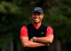 FILE - In this Oct. 28, 2019, file photo, Tiger Woods smiles during the winner's ceremony after winning the Zozo Championship PGA Tour at the Accordia Golf Narashino country club in Inzai, east of Tokyo, Japan. A man who found Woods unconscious in a mangled SUV last week after the golf star who later told sheriff's deputies he did not know how the collision occurred and didn't even remember driving, crashed the vehicle in Southern California, authorities said in court documents. Law enforcement has not previously disclosed that Woods had been unconscious following the collision. (AP Photo/Lee Jin-man, File)