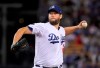 FILE - This Sept. 20, 2019 file photo shows Los Angeles Dodgers starting pitcher Clayton Kershaw pitching to the Colorado Rockies baseball team in Los Angeles. In what's become a familiar refrain, the Dodgers arrive at camp still looking for their first World Series championship since 1988. After losing in two straight World Series, they were ousted by Washington in five games in the NL Division Series last fall. The team had a quiet offseason,(AP Photo/Mark J. Terrill, File)